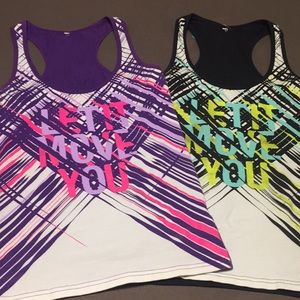 2 Zumba tanks. Tags cut out size smalls